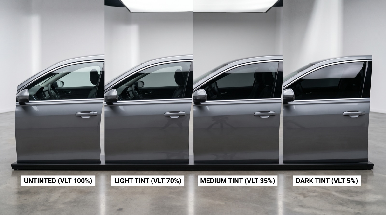 Comparison of window tint shades showing different VLT darkness levels on a car